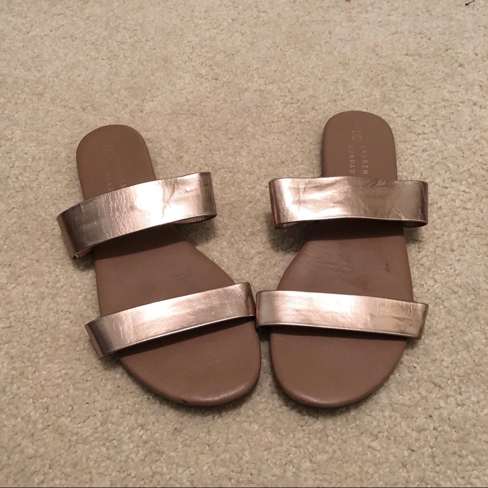 Metallic gold flip flops